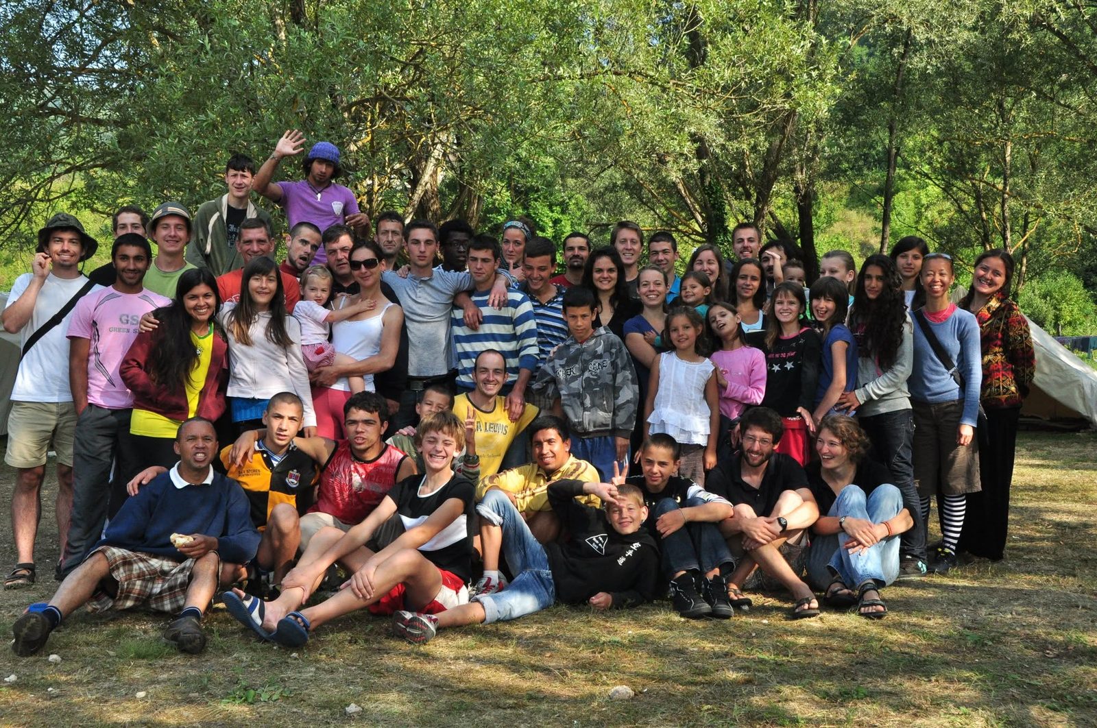 A large group gathered together outdoors