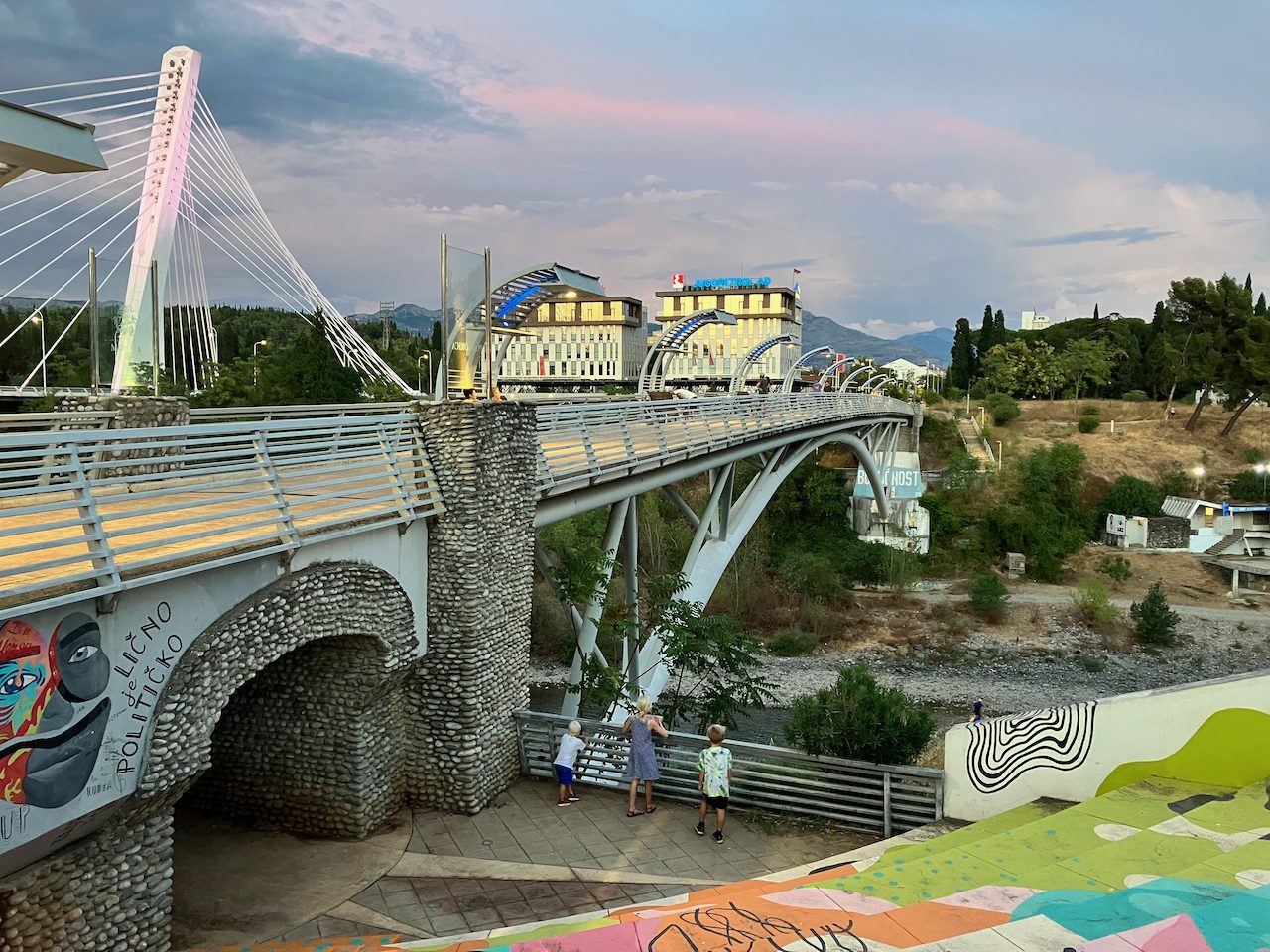 A modern pedestrian bridge over a river